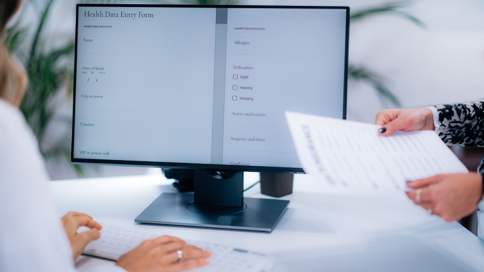 health data entry form on a computer screen, doctors