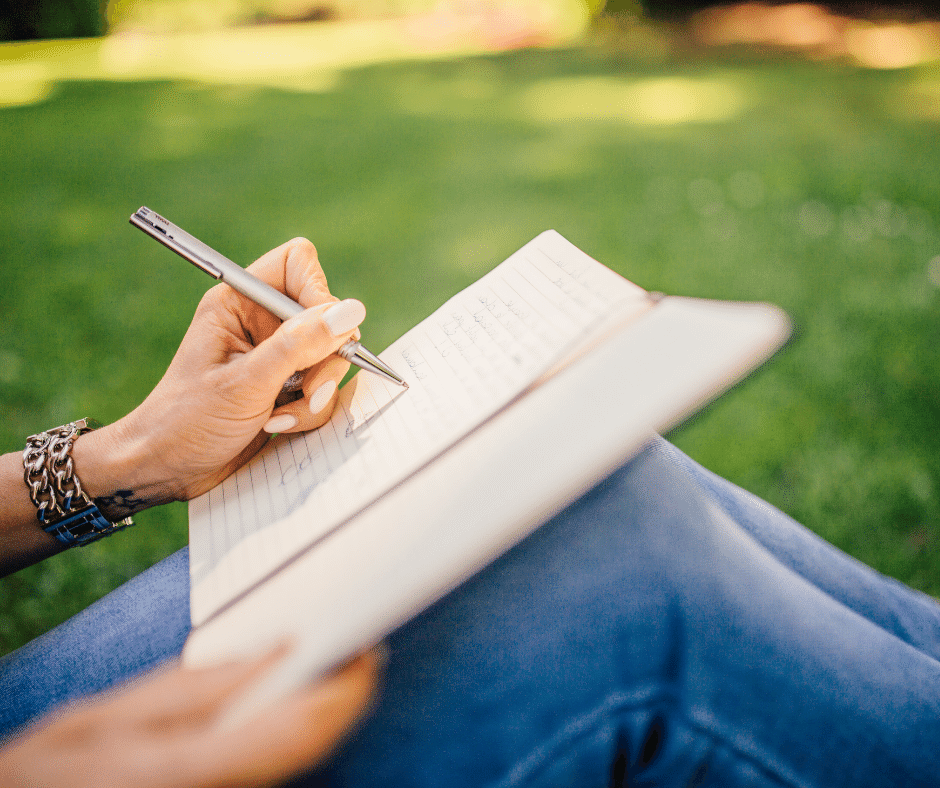 Person writing in a notebook