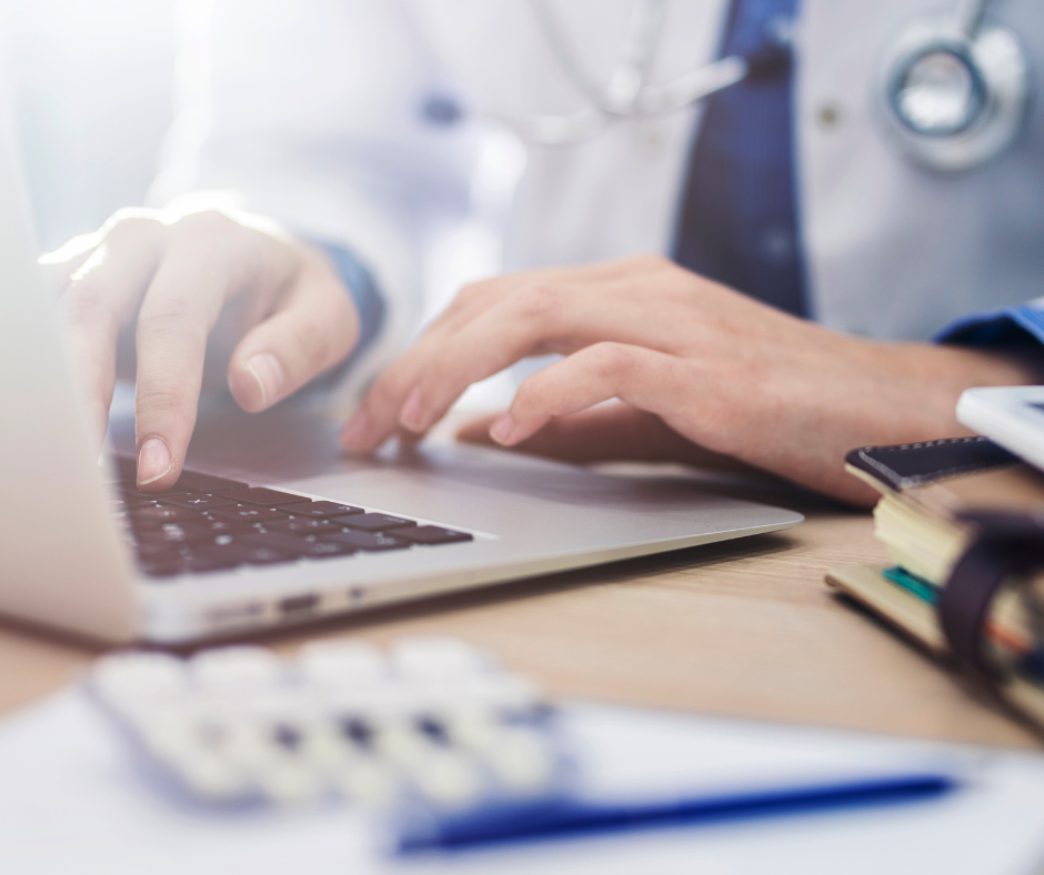 Doctor on computer